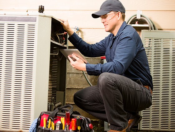 Man working on air conditioner